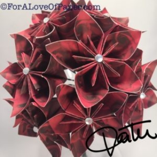 Paper flowers made of red rose scrapbook paper