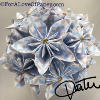 White paper flowers with blue and grey pattern