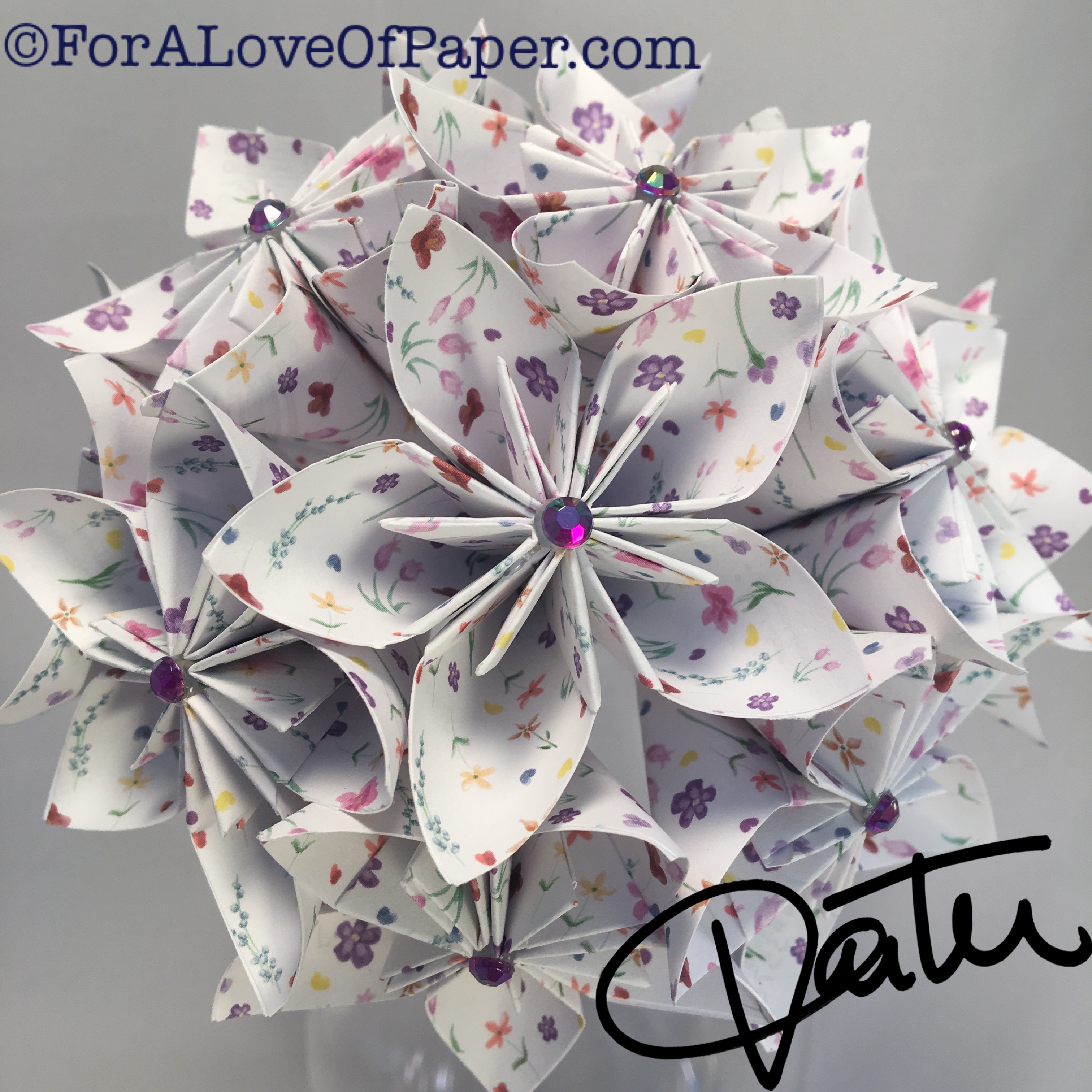 Paper flowers using small purple print paper