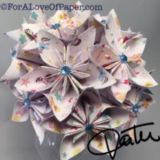 Paper flower bouquet made from my little pony paper with blue gems