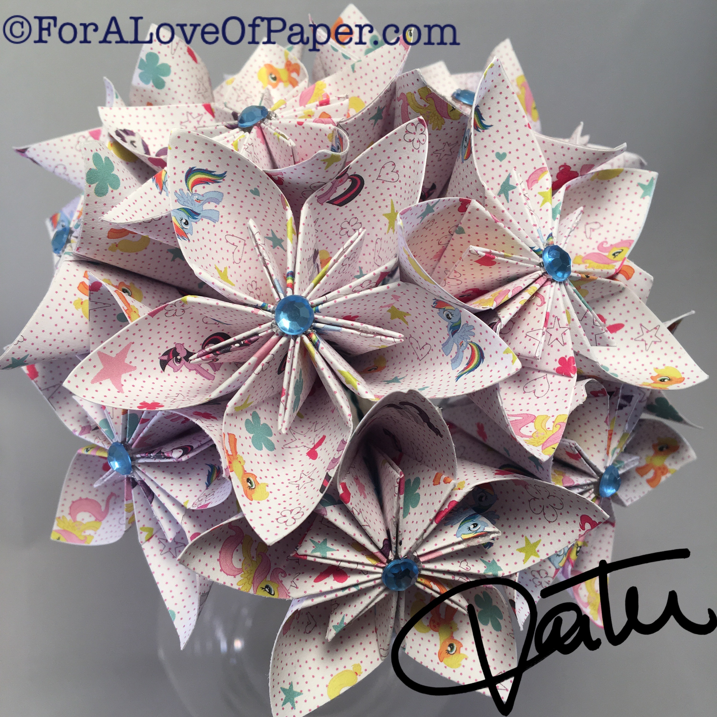 Paper flower bouquet made from my little pony paper with blue gems