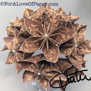 Paper flower bouquet made from mocha colored paper with decorative pattern